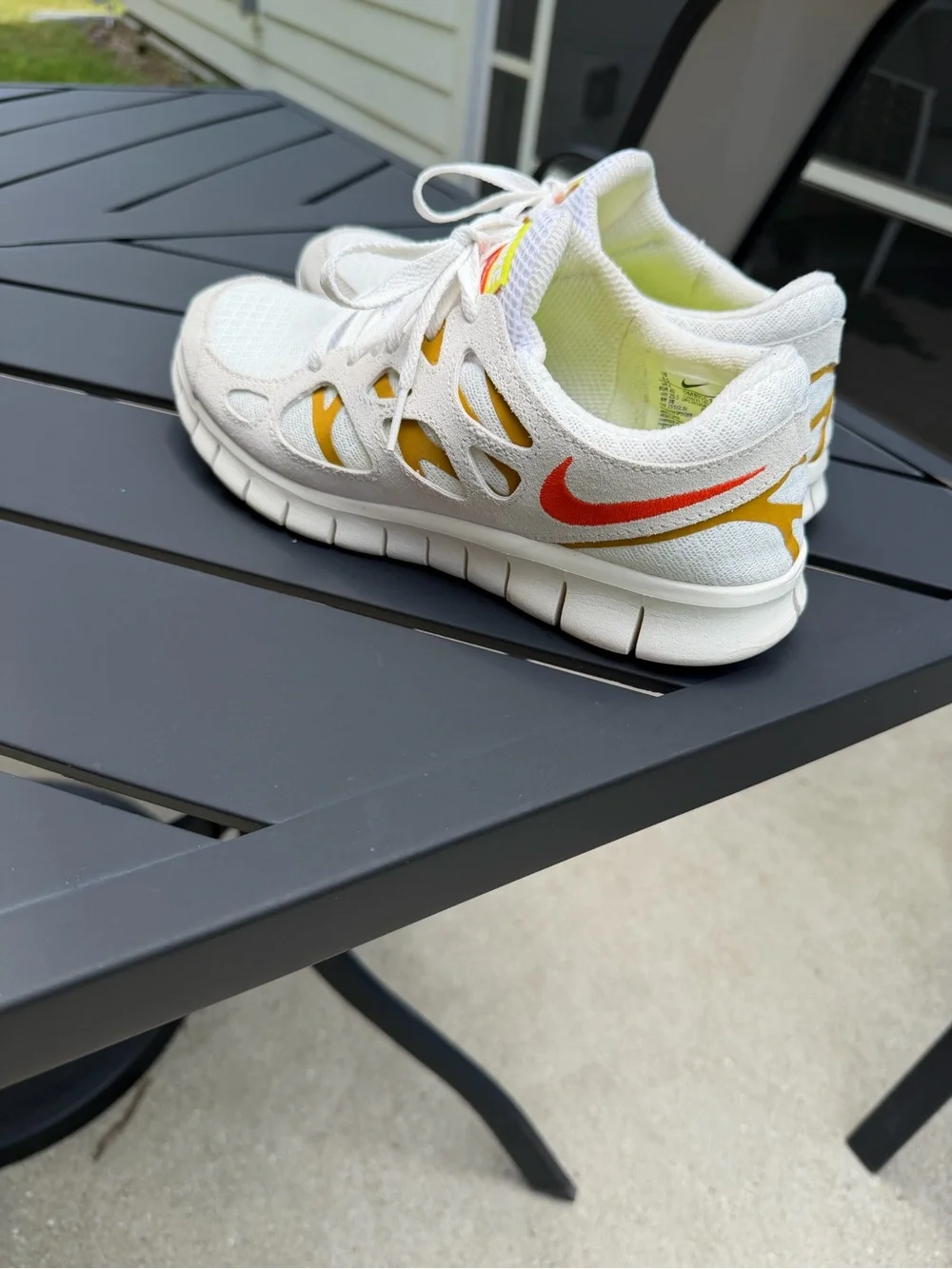 Nike White and Yellow Mesh Athletic Sneakers with Red Swoosh